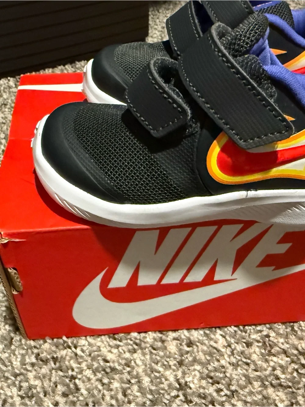 Nike Kids Black Sneakers with Red & Yellow Flame Accent